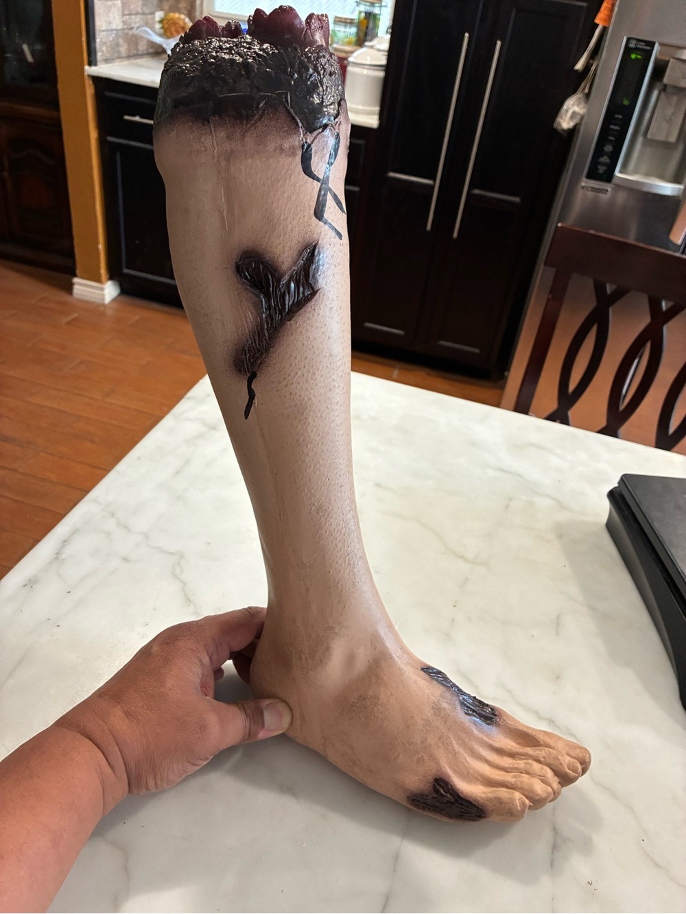 Spirit Halloween latex severed leg